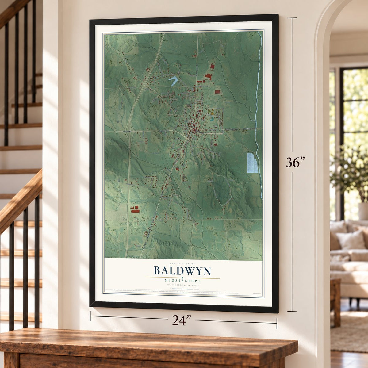 Baldwyn, Mississippi map, 24 x 36 inch print in a black frame by a staircase