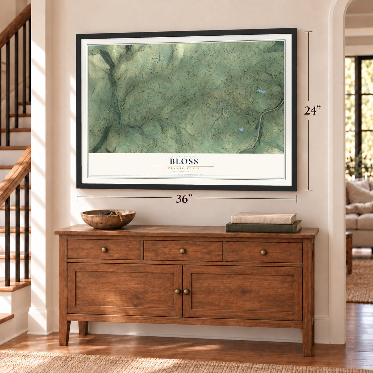 Bloss, Pennsylvania map, 24 x 36 inch print in a black frame above a dresser by a staircase
