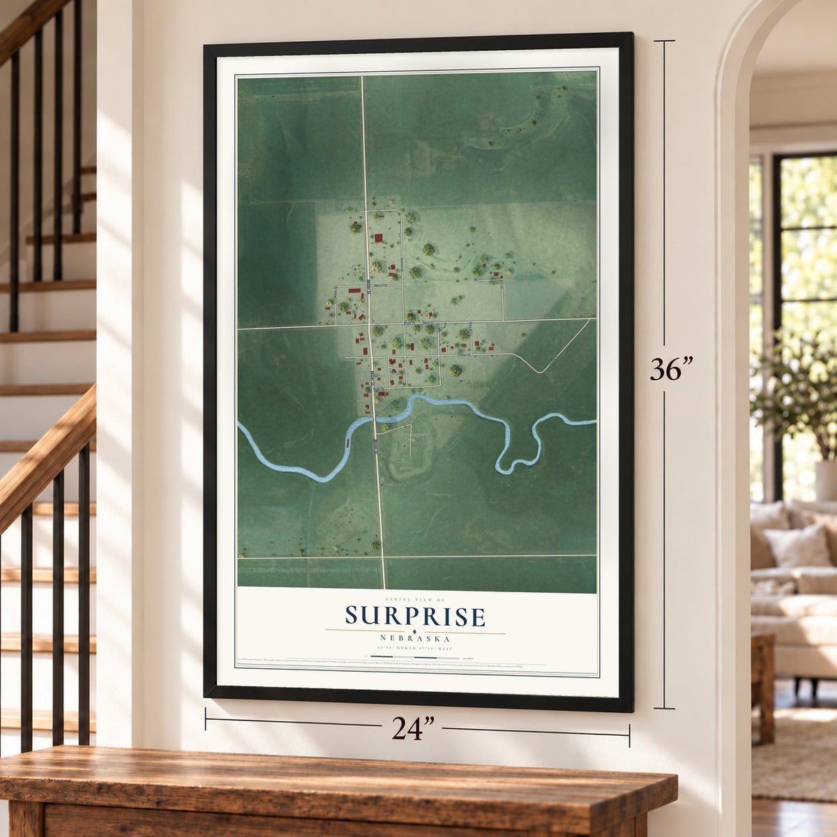 Surprise, Nebraska map, 24 x 36 inch print in a black frame by a staircase