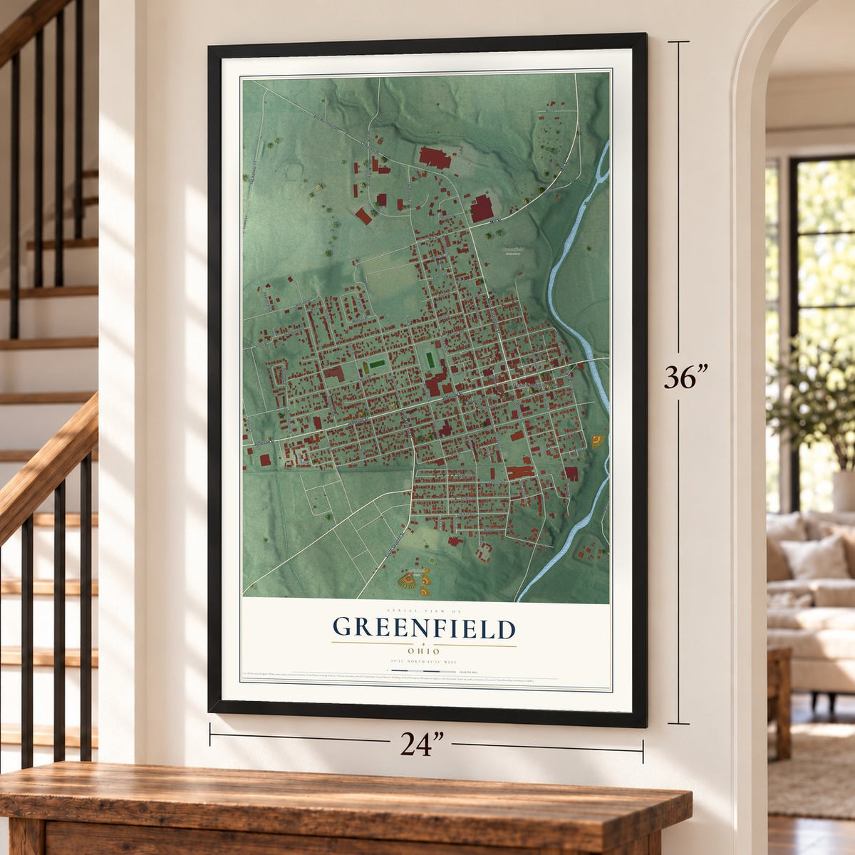 Greenfield, Ohio map, 24 x 36 inch print in a black frame by a staircase