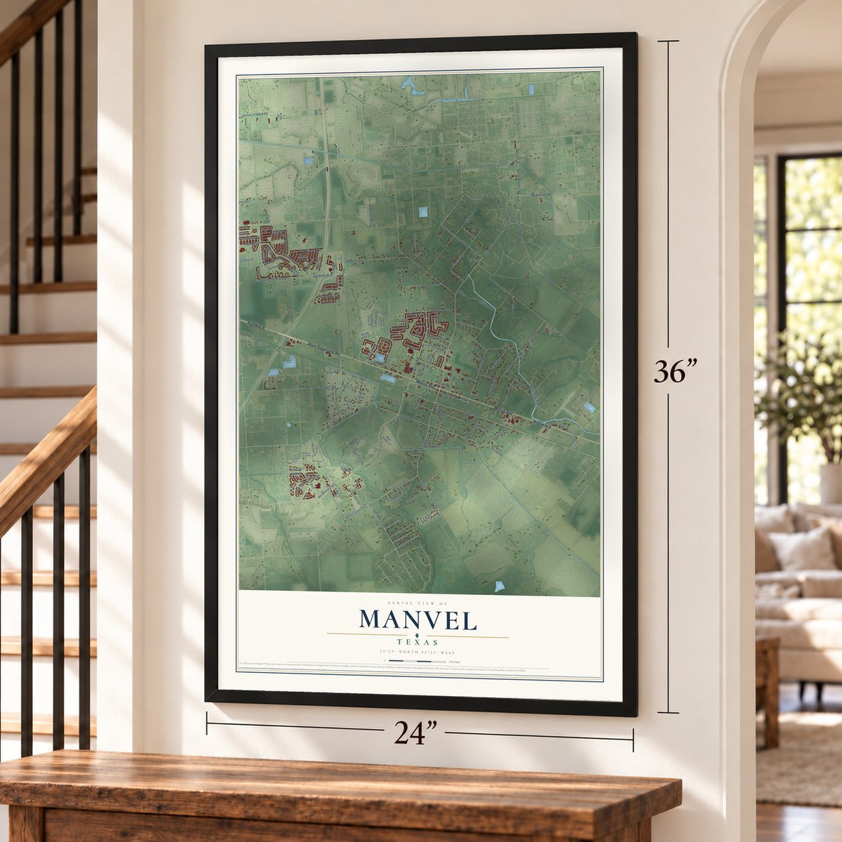 Manvel, Texas map, 24 x 36 inch print in a black frame by a staircase