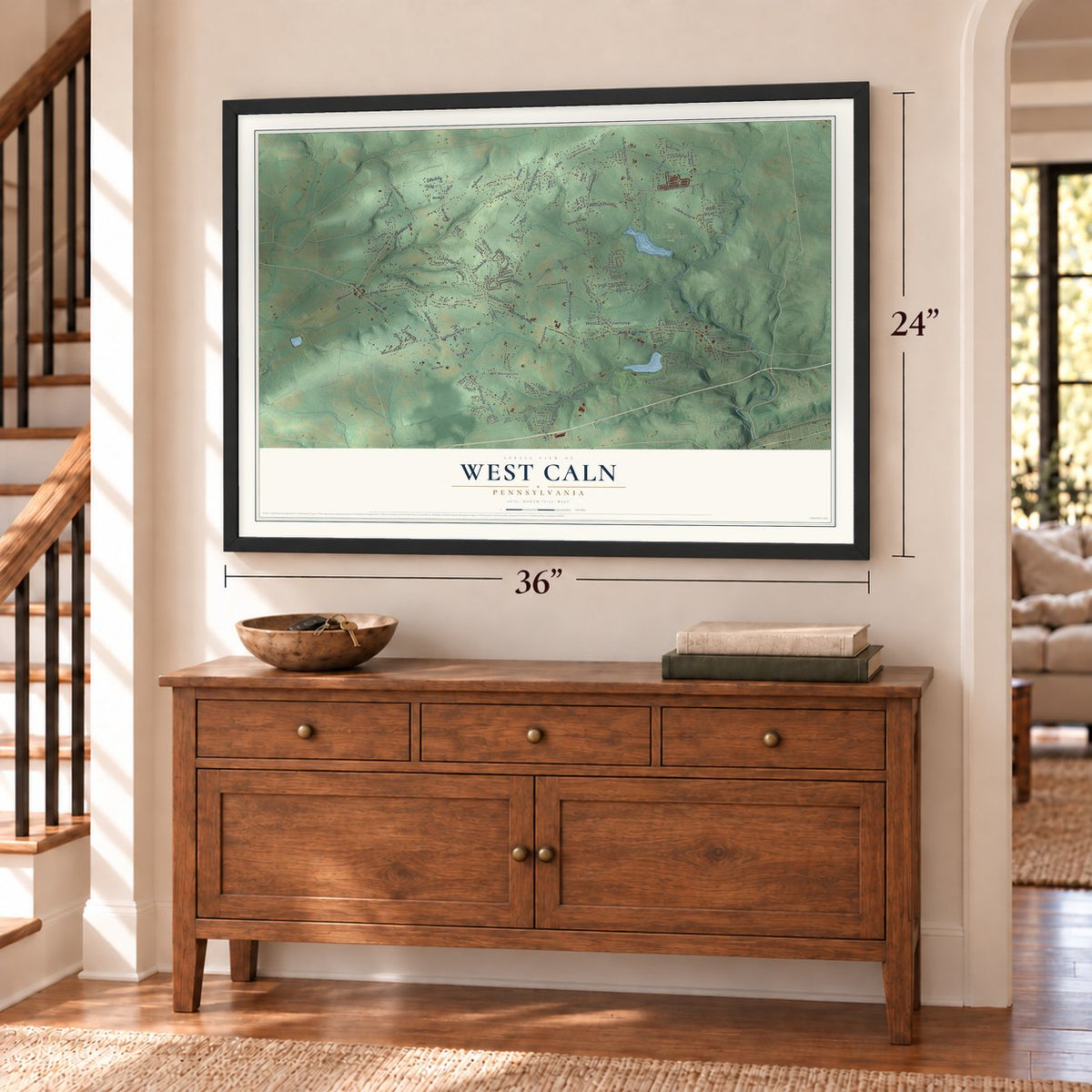 West Caln, Pennsylvania map, 24 x 36 inch print in a black frame above a dresser by a staircase