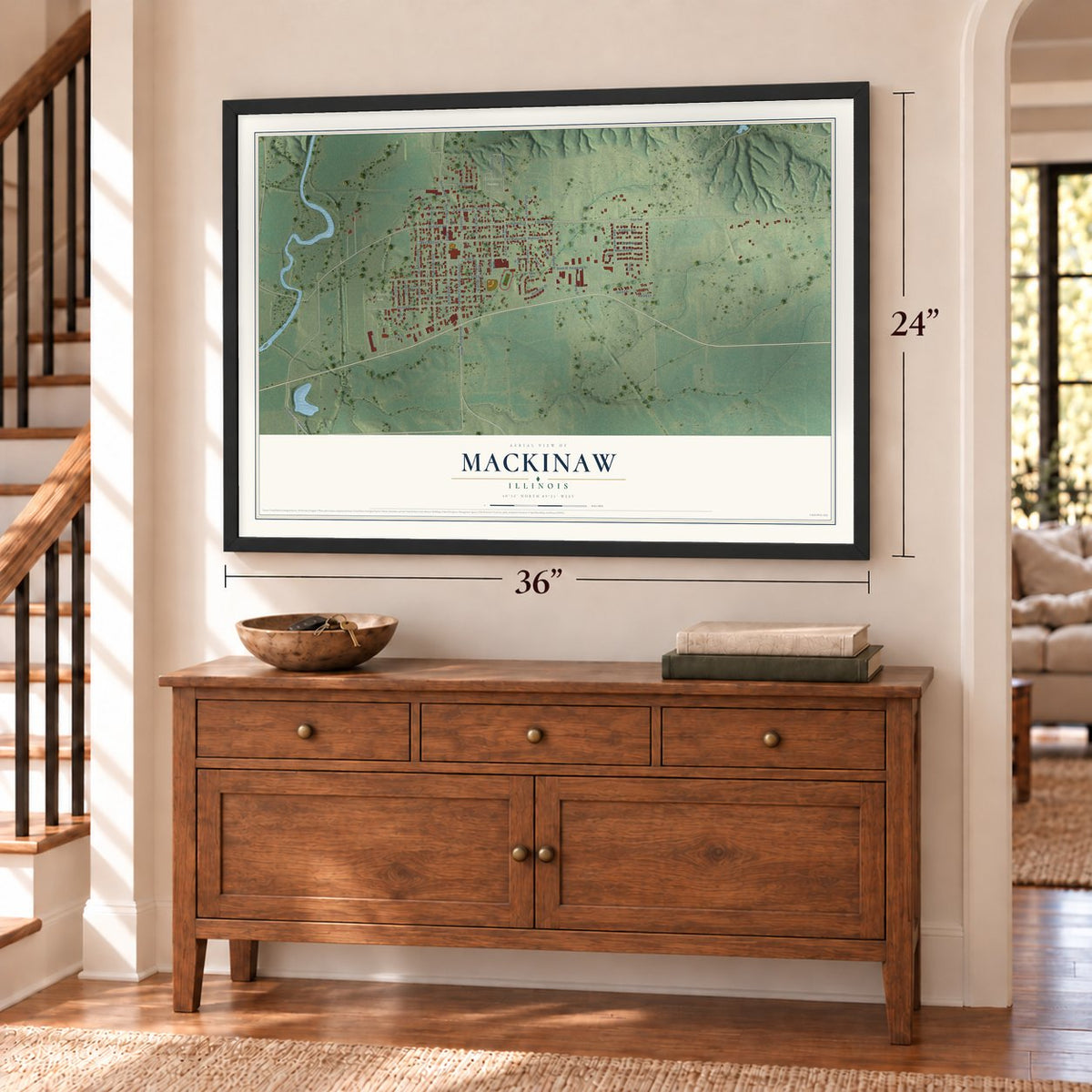 Mackinaw, Illinois map, 24 x 36 inch print in a black frame above a dresser by a staircase