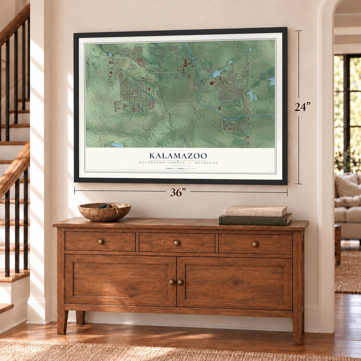 Kalamazoo, Kalamazoo County, Michigan map, 24 x 36 inch print in a black frame above a dresser by a staircase