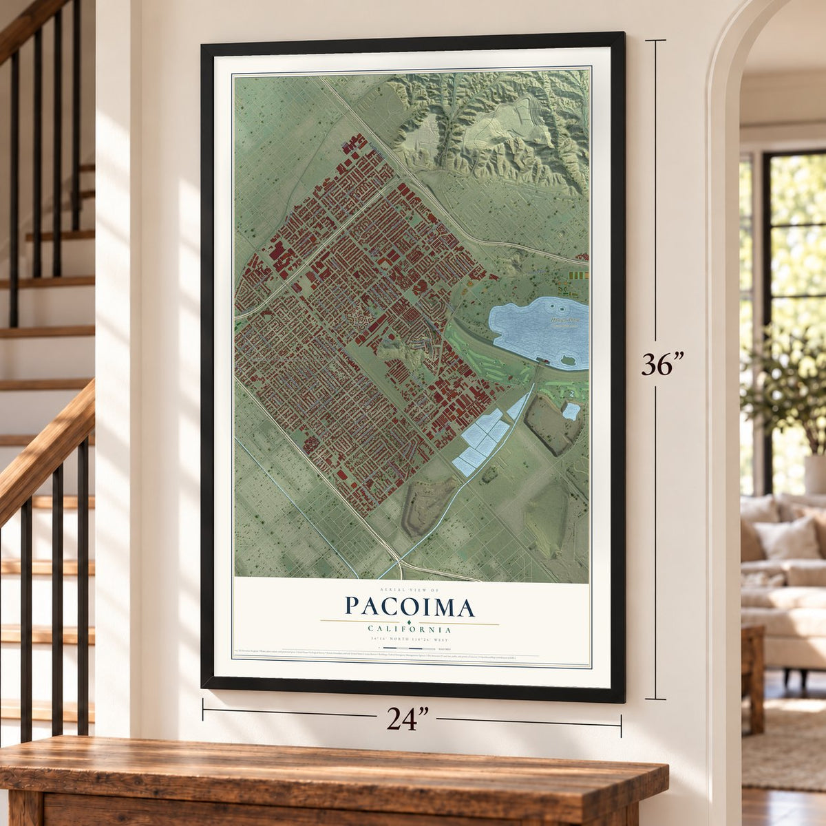 Pacoima, California map, 24 x 36 inch print in a black frame by a staircase