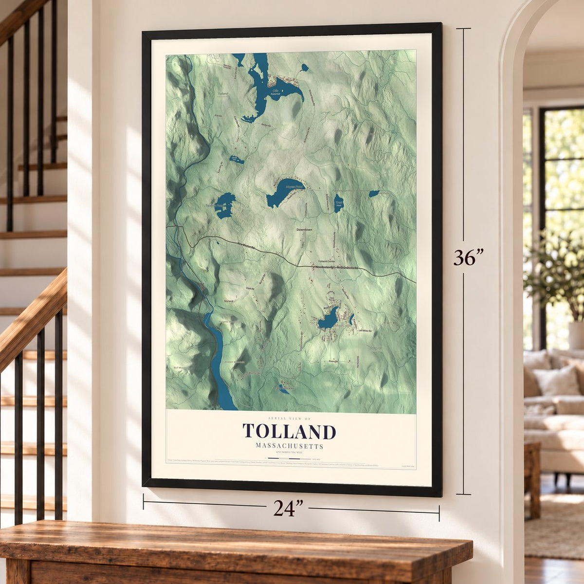 Tolland, Massachusetts map, 24 x 36 inch print in a black frame by a staircase