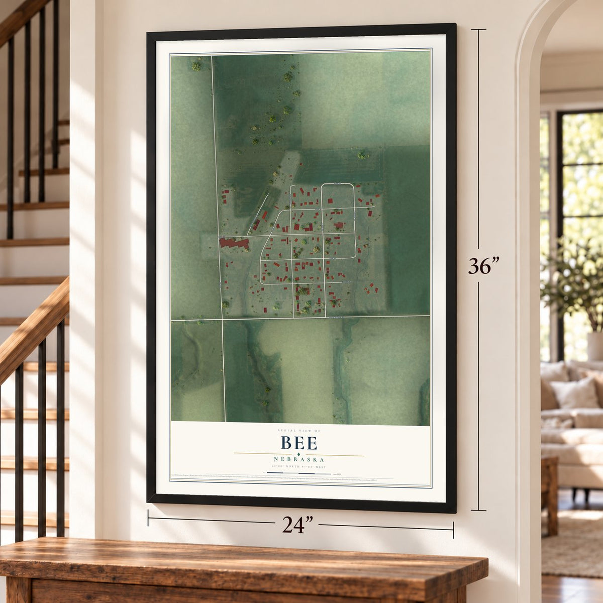 Bee, Nebraska map, 24 x 36 inch print in a black frame by a staircase