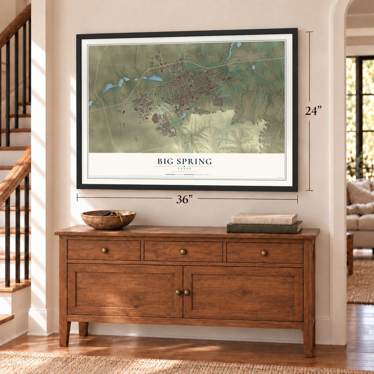 Big Spring, Texas map, 24 x 36 inch print in a black frame above a dresser by a staircase