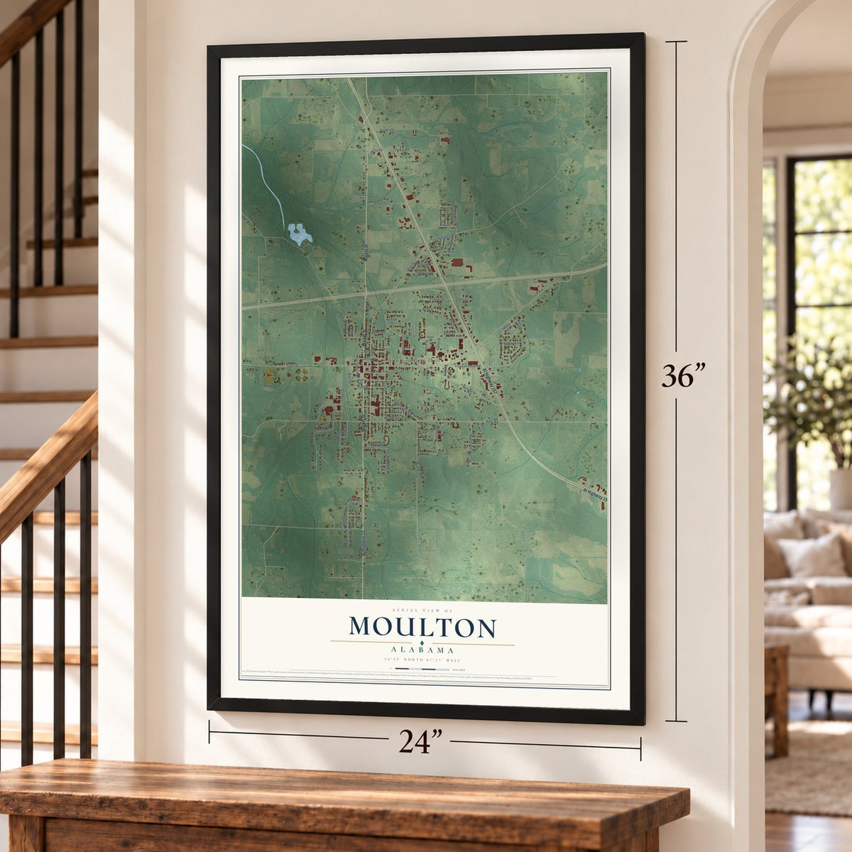 Moulton, Alabama map, 24 x 36 inch print in a black frame by a staircase
