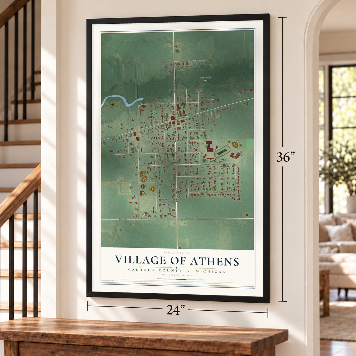 Athens, Michigan map, 24 x 36 inch print in a black frame by a staircase