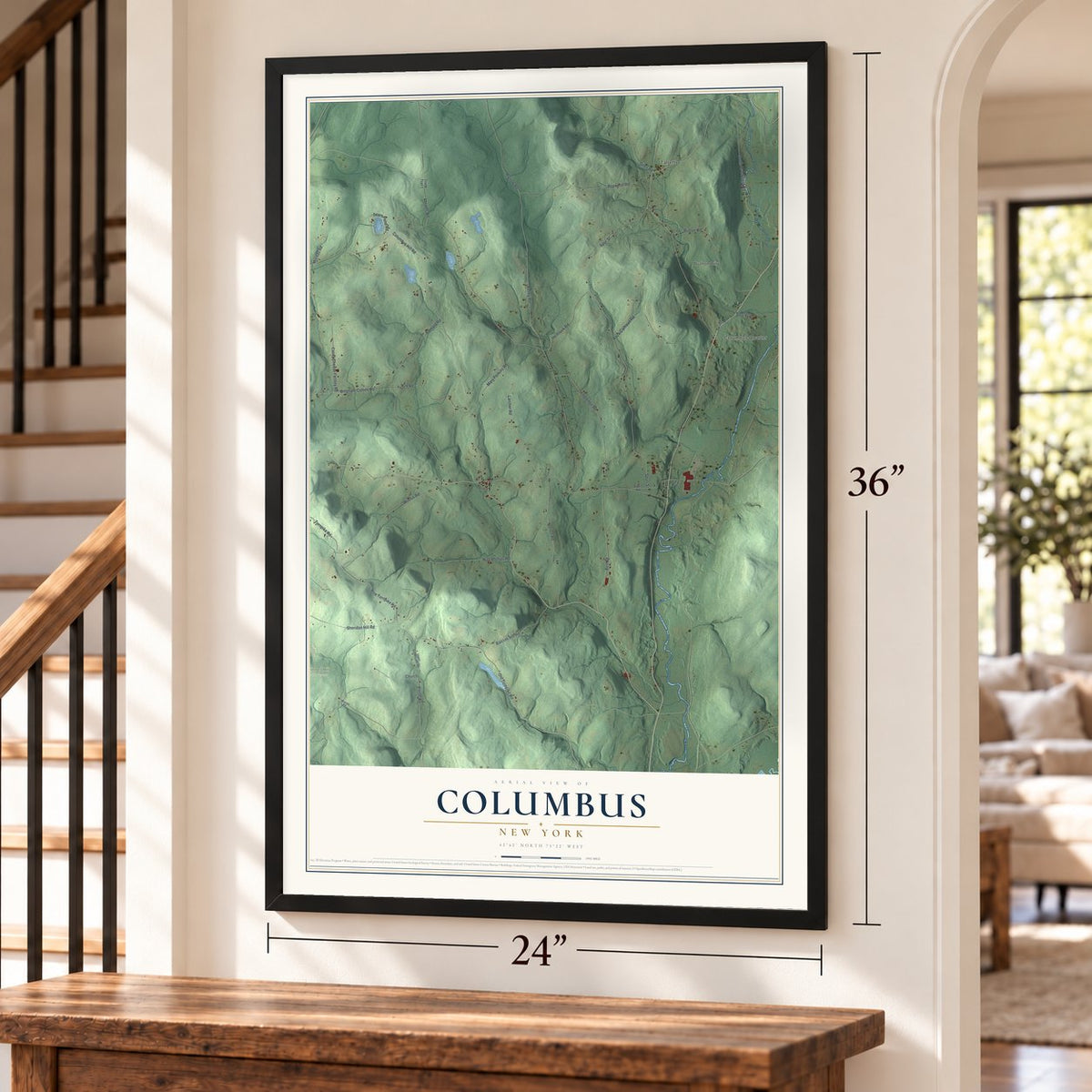 Columbus, New York map, 24 x 36 inch print in a black frame by a staircase