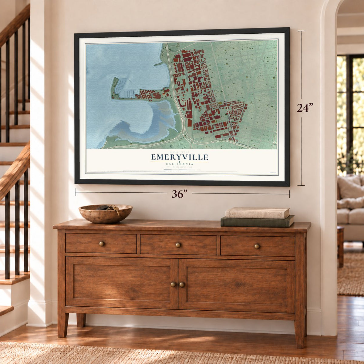 Emeryville, California map, 24 x 36 inch print in a black frame above a dresser by a staircase
