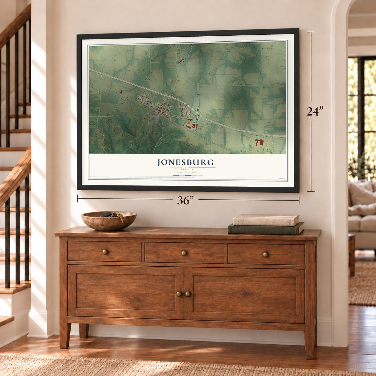Jonesburg, Missouri map, 24 x 36 inch print in a black frame above a dresser by a staircase