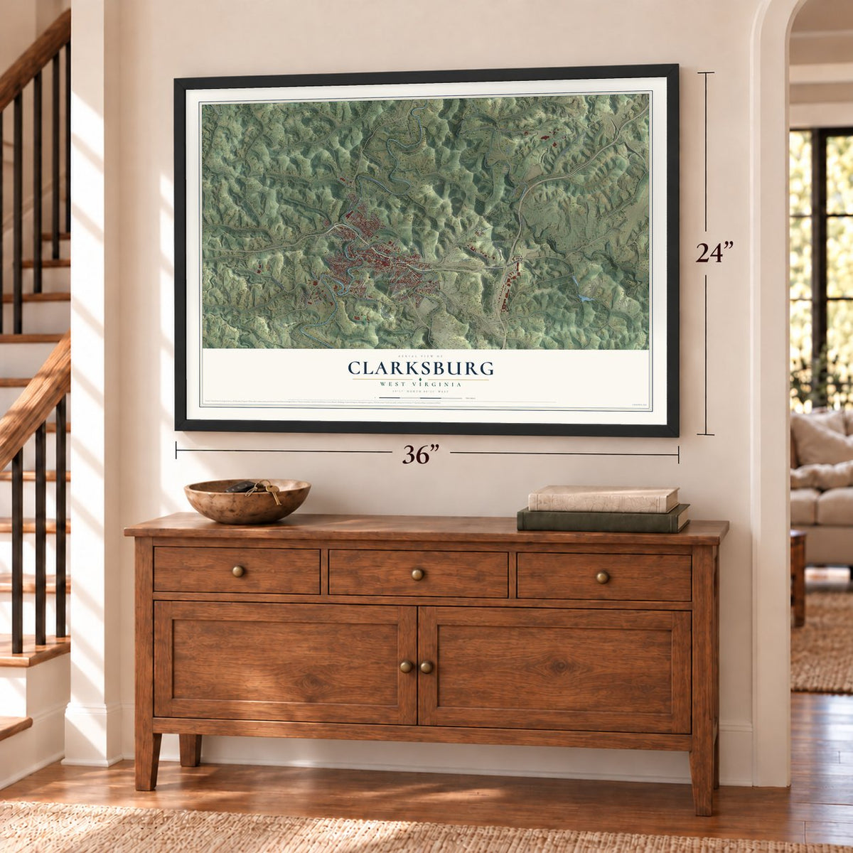 Clarksburg, West Virginia map, 24 x 36 inch print in a black frame above a dresser by a staircase