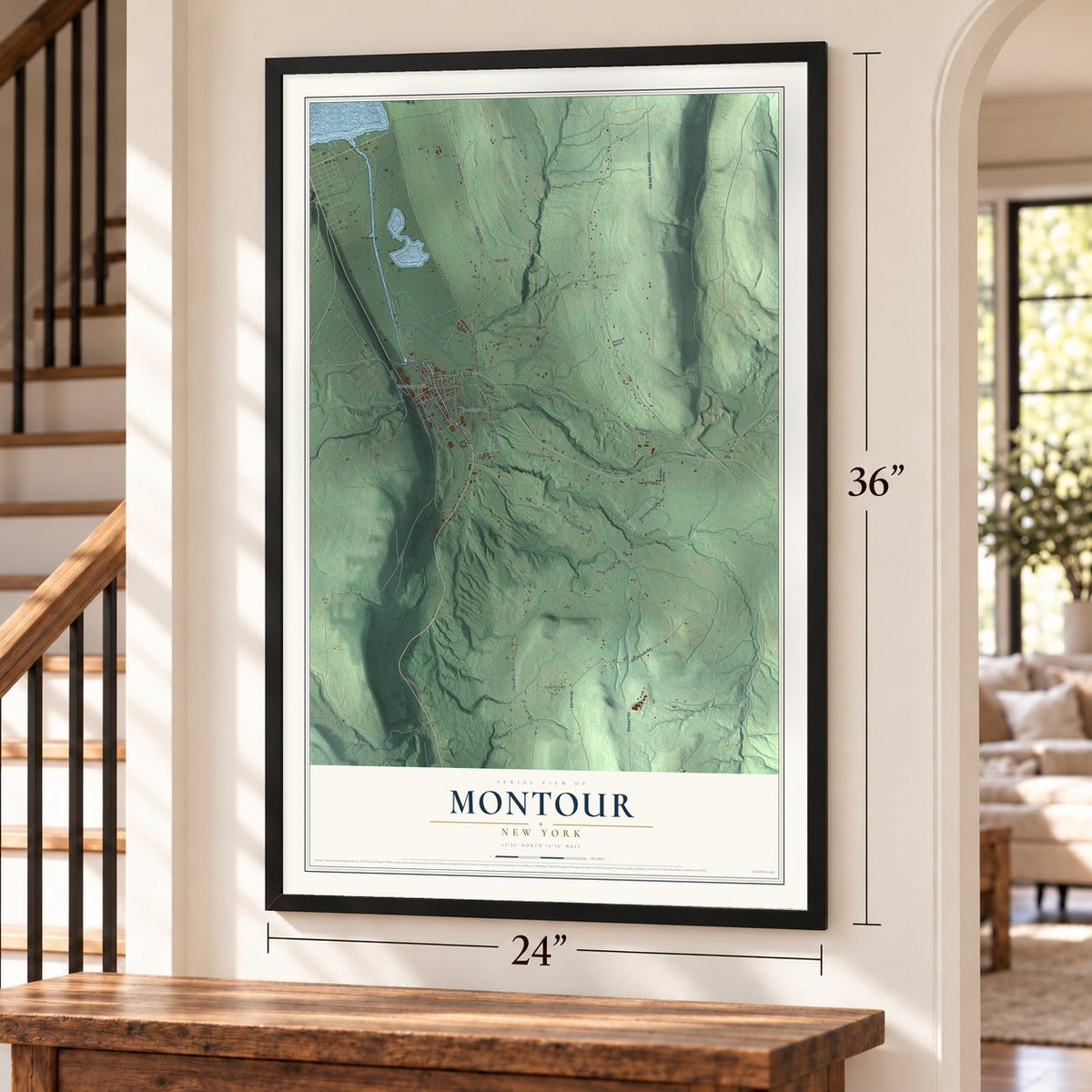 Montour, New York map, 24 x 36 inch print in a black frame by a staircase