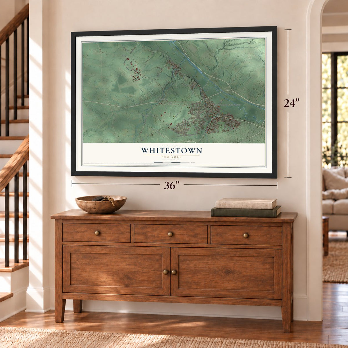 Whitestown, New York map, 24 x 36 inch print in a black frame above a dresser by a staircase
