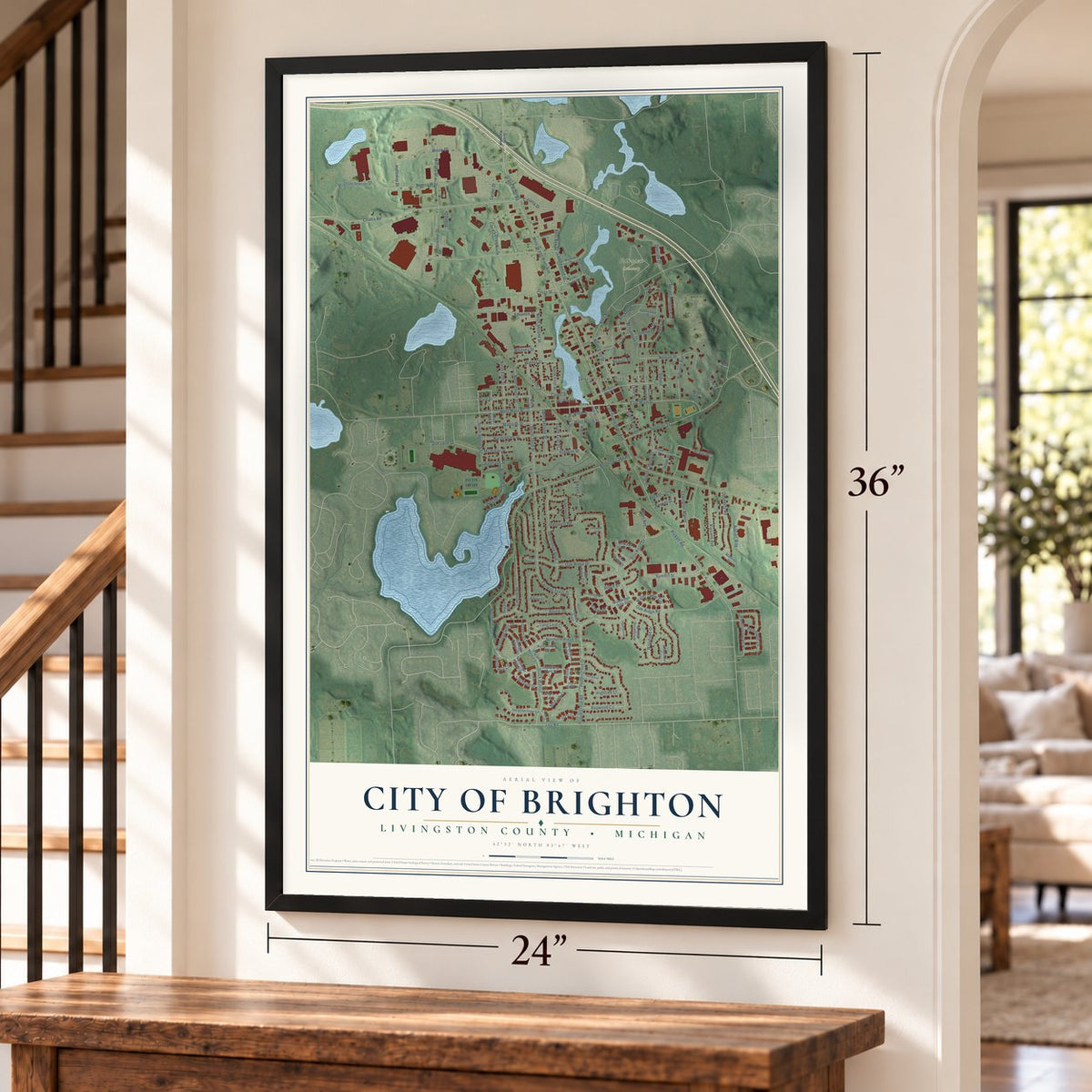 Brighton, Michigan map, 24 x 36 inch print in a black frame by a staircase