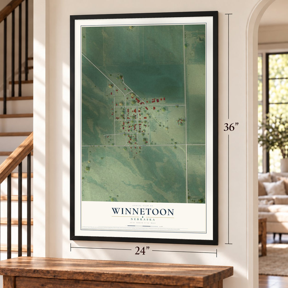 Winnetoon, Nebraska map, 24 x 36 inch print in a black frame by a staircase