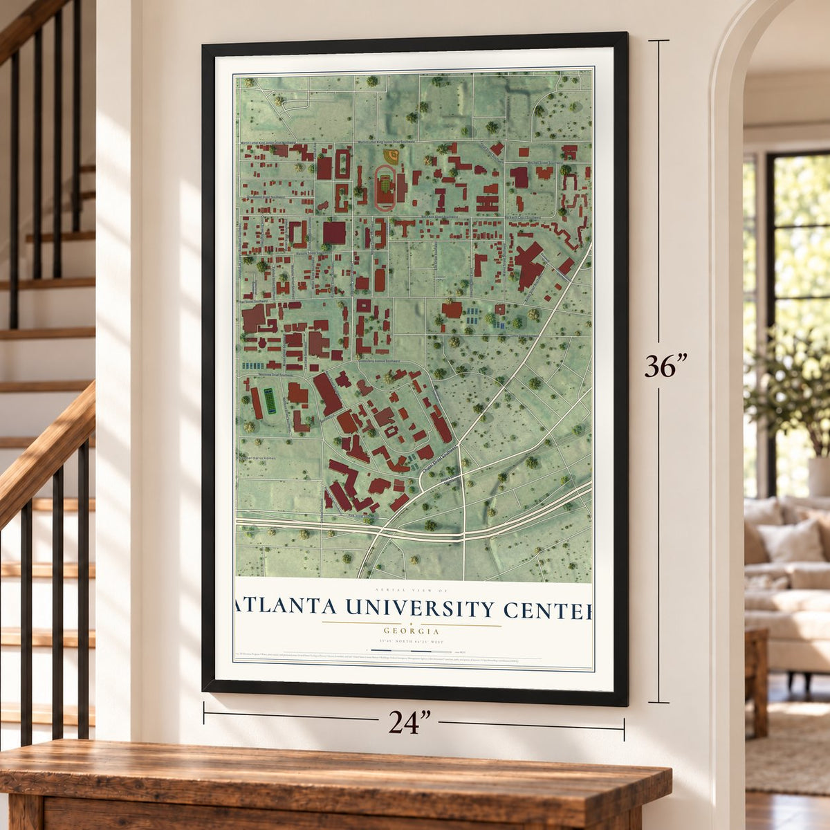Atlanta University Center, Georgia map, 24 x 36 inch print in a black frame by a staircase