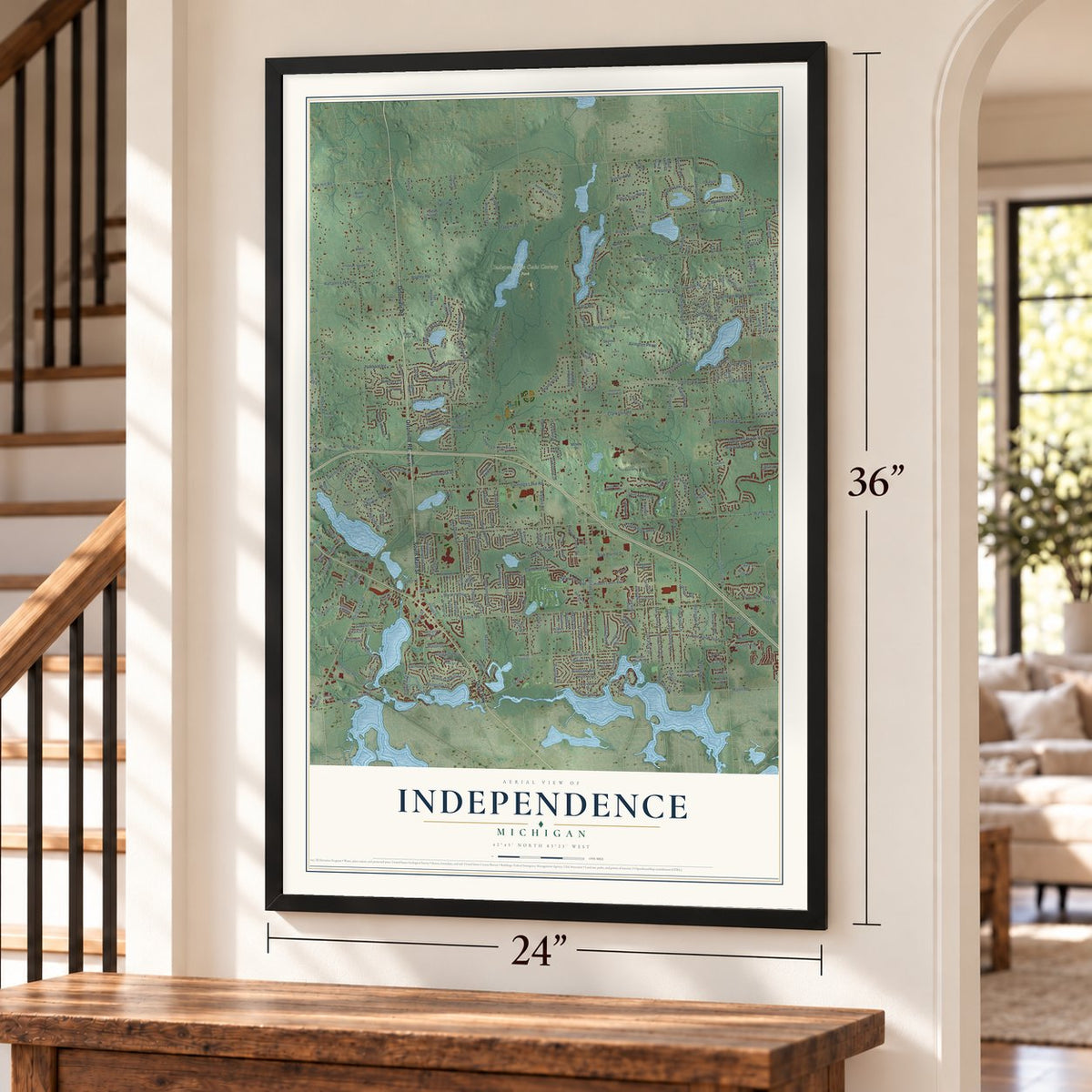 Independence, Michigan map, 24 x 36 inch print in a black frame by a staircase