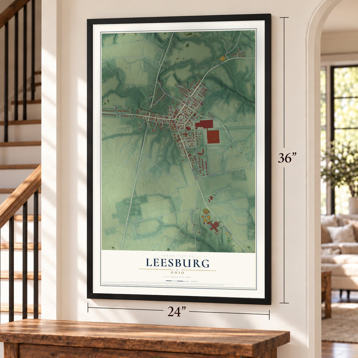 Leesburg, Ohio map, 24 x 36 inch print in a black frame by a staircase