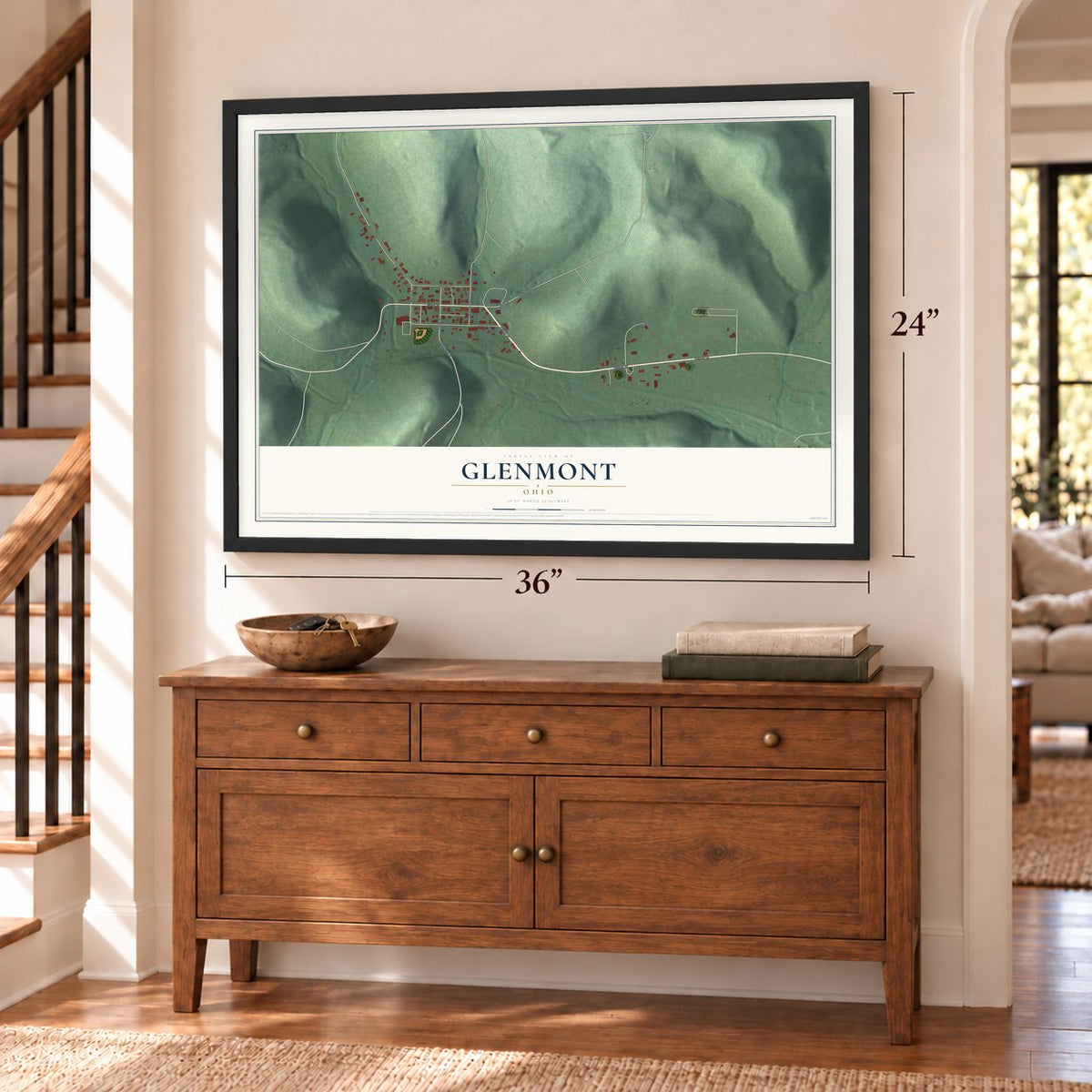 Glenmont, Ohio map, 24 x 36 inch print in a black frame above a dresser by a staircase