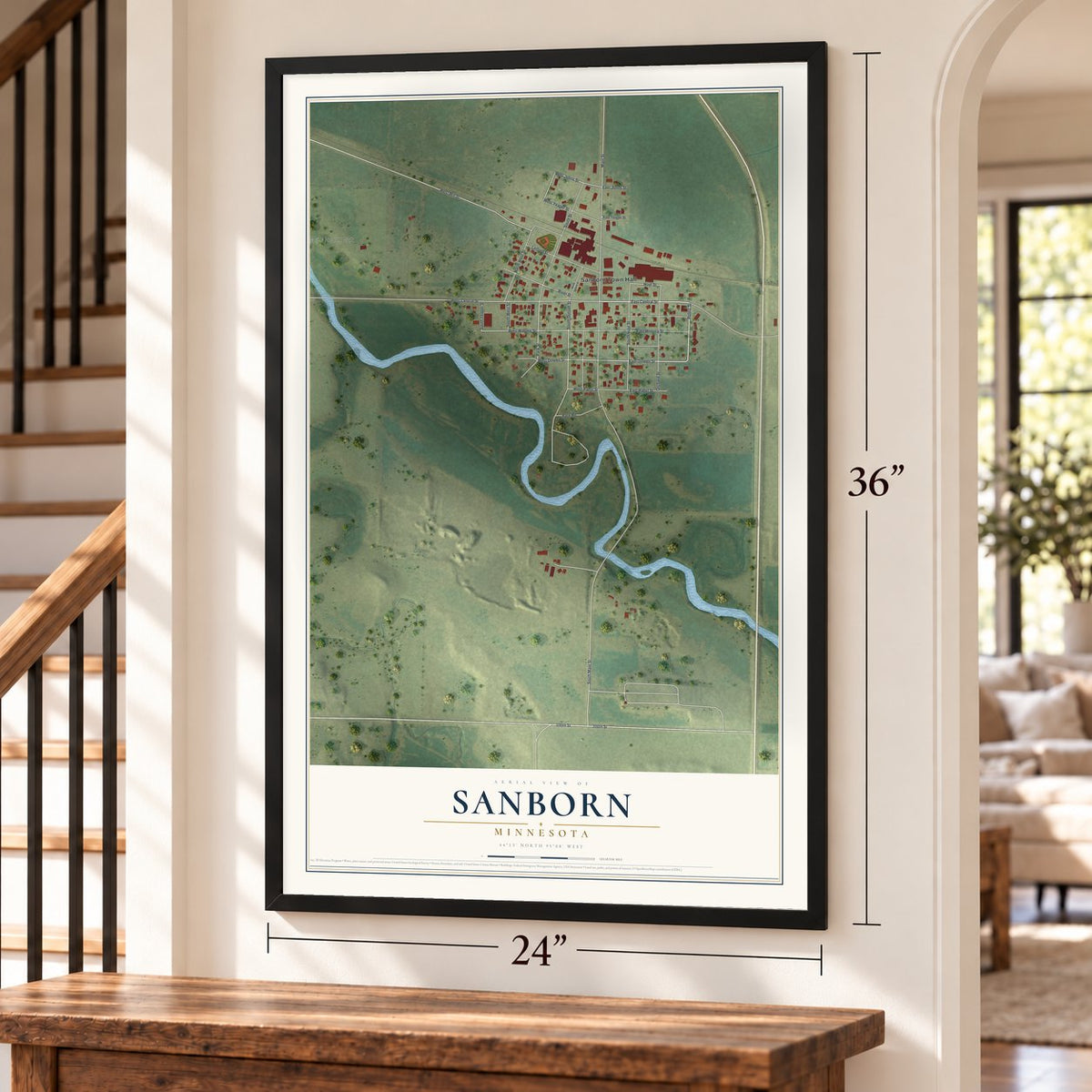 Sanborn, Minnesota map, 24 x 36 inch print in a black frame by a staircase