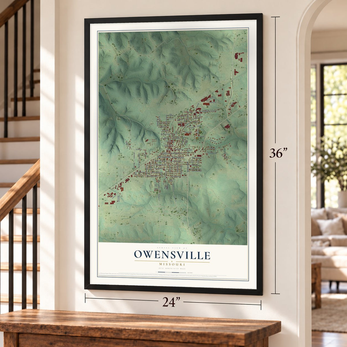 Owensville, Missouri map, 24 x 36 inch print in a black frame by a staircase