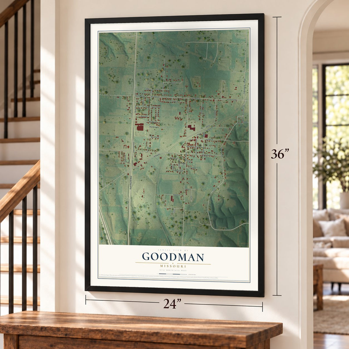Goodman, Missouri map, 24 x 36 inch print in a black frame by a staircase