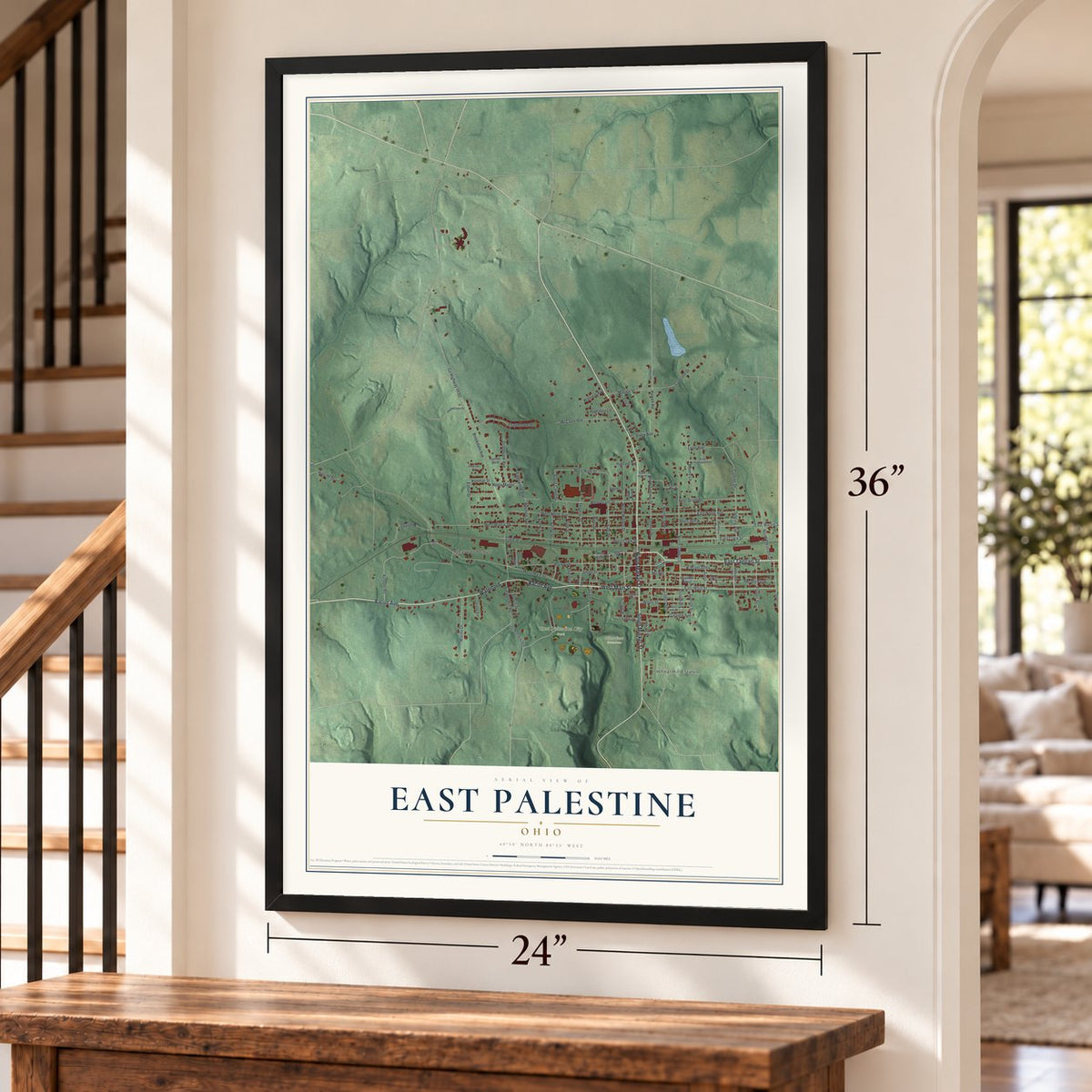 East Palestine, Ohio map, 24 x 36 inch print in a black frame by a staircase