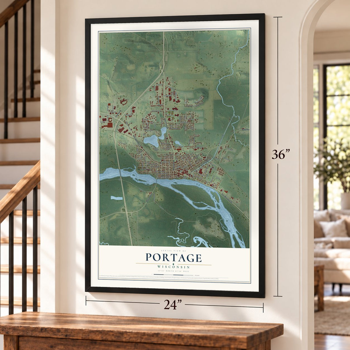Portage, Wisconsin map, 24 x 36 inch print in a black frame by a staircase