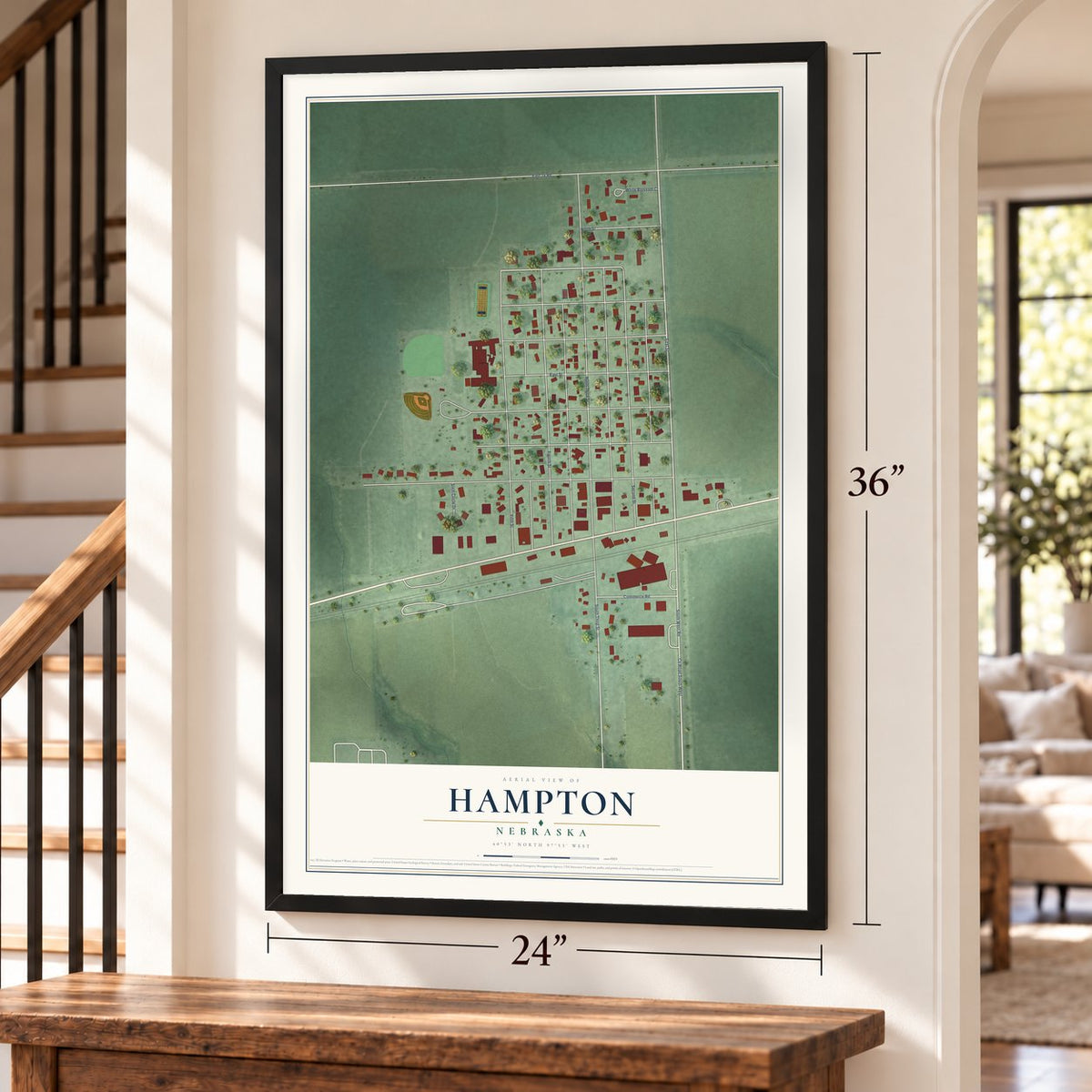 Hampton, Nebraska map, 24 x 36 inch print in a black frame by a staircase