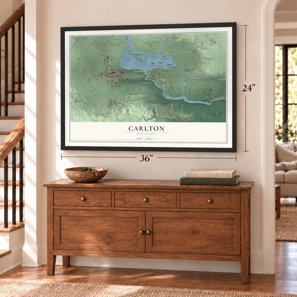 Carlton, Minnesota map, 24 x 36 inch print in a black frame above a dresser by a staircase