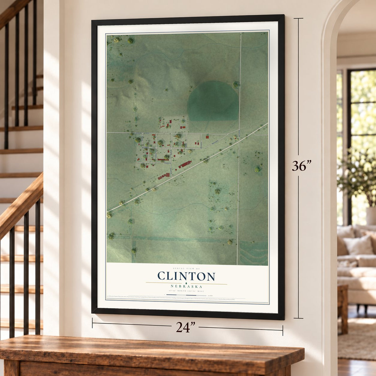 Clinton, Nebraska map, 24 x 36 inch print in a black frame by a staircase