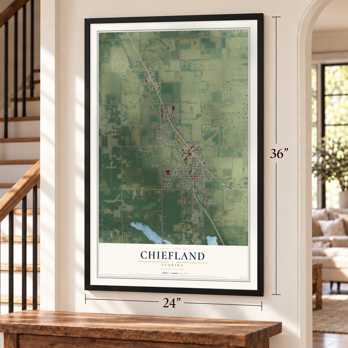 Chiefland, Florida map, 24 x 36 inch print in a black frame by a staircase