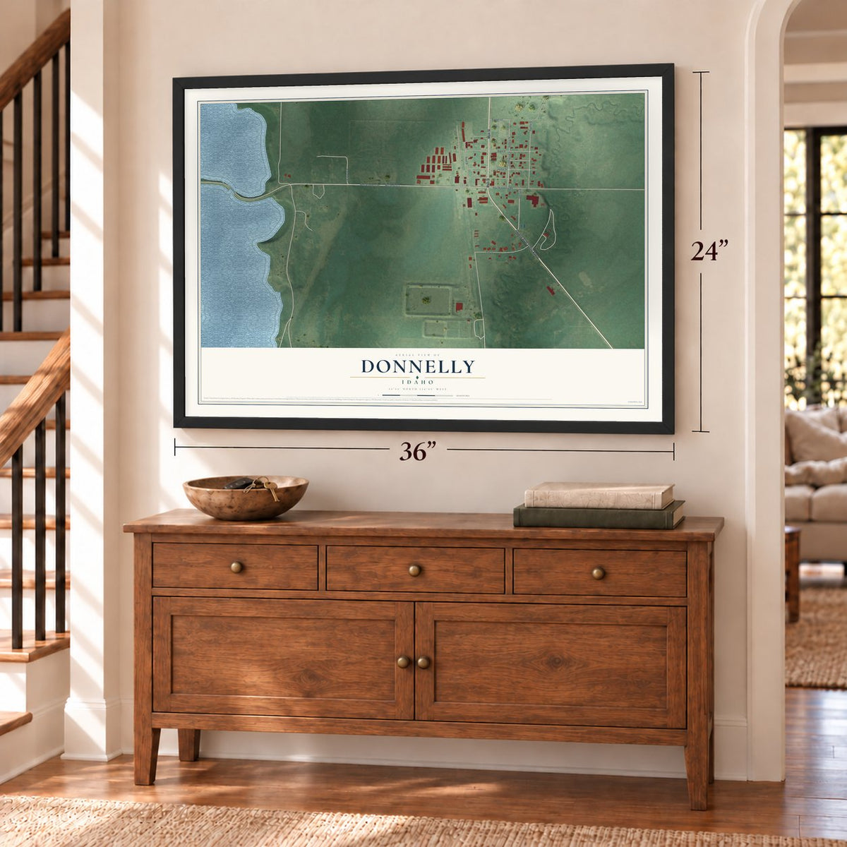 Donnelly, Idaho map, 24 x 36 inch print in a black frame above a dresser by a staircase