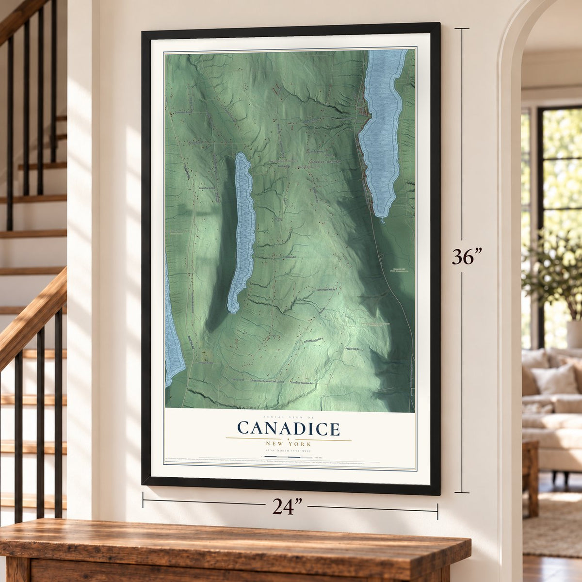 Canadice, New York map, 24 x 36 inch print in a black frame by a staircase