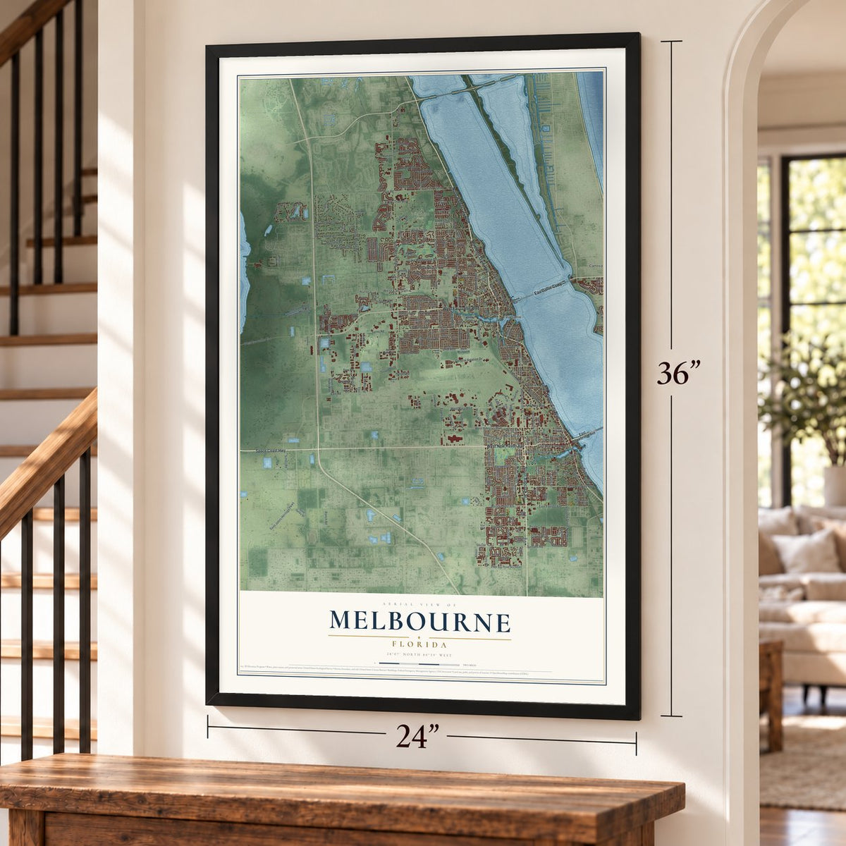 Melbourne, Florida map, 24 x 36 inch print in a black frame by a staircase