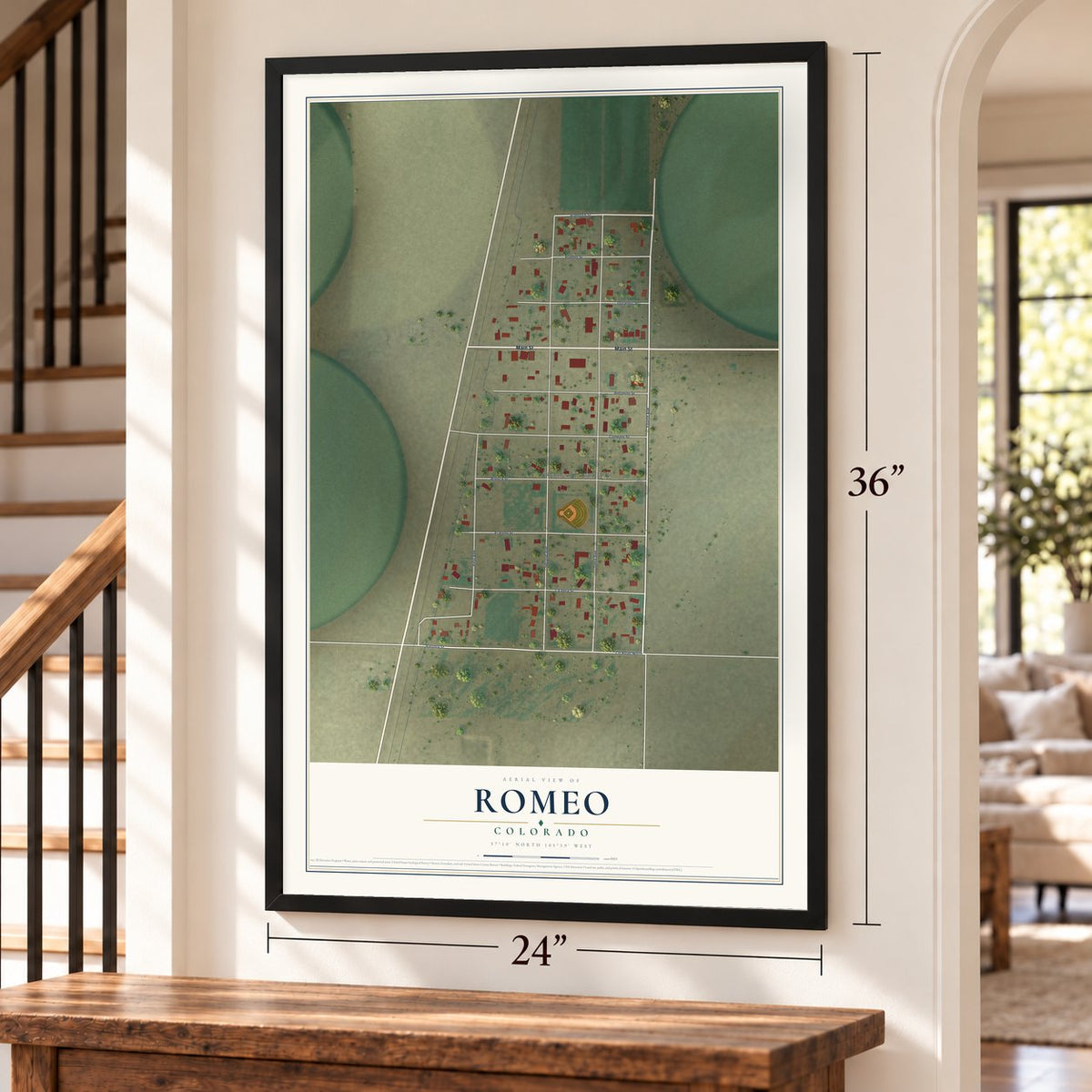 Romeo, Colorado map, 24 x 36 inch print in a black frame by a staircase
