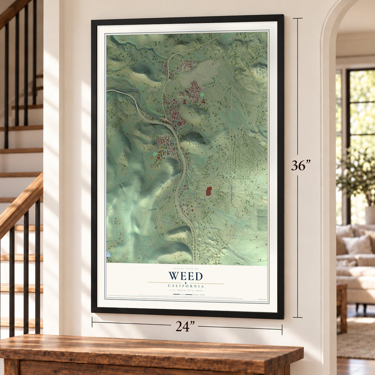 Weed, California map, 24 x 36 inch print in a black frame by a staircase