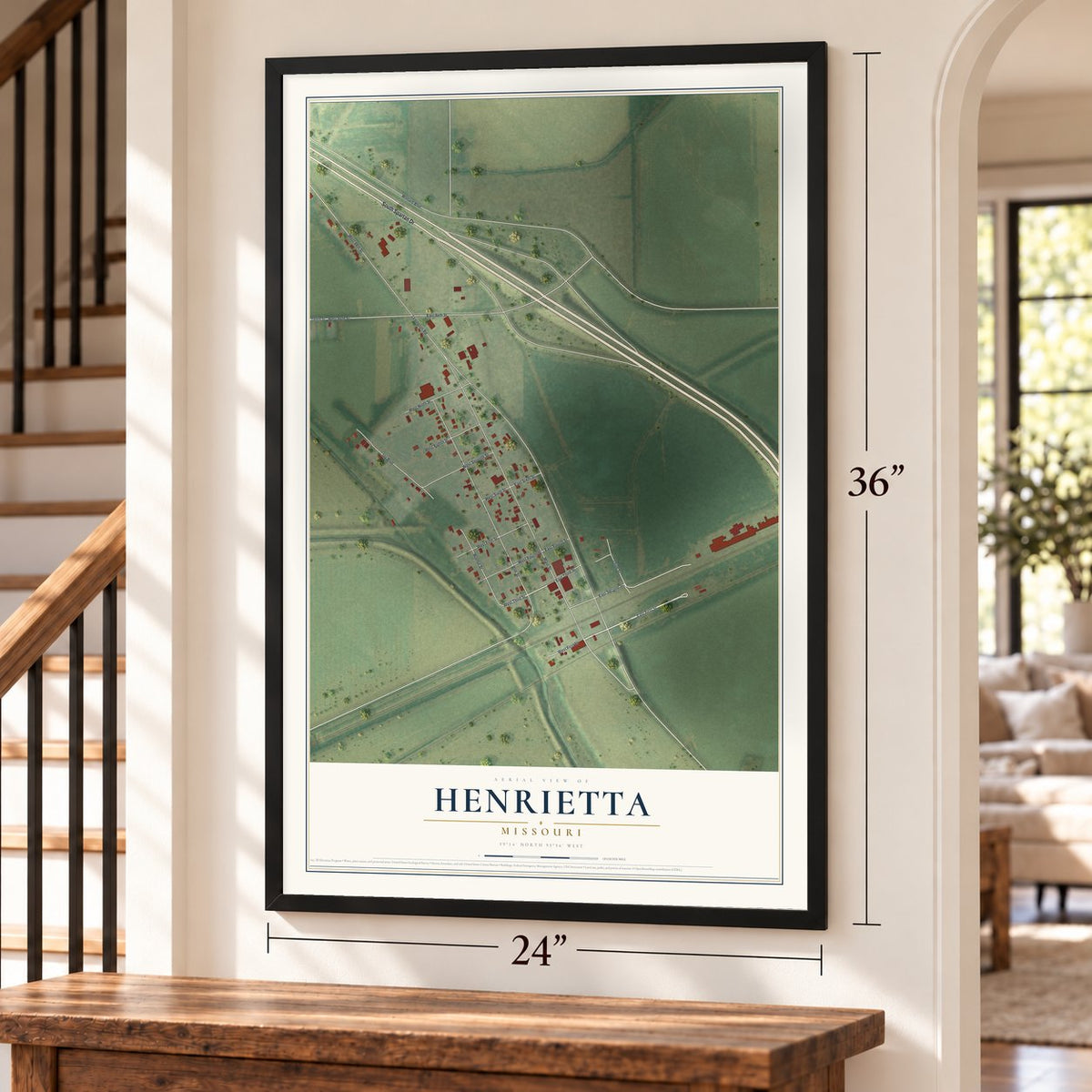 Henrietta, Missouri map, 24 x 36 inch print in a black frame by a staircase