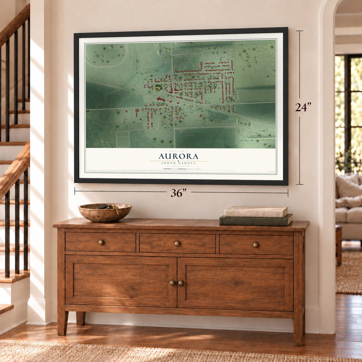 Aurora, South Dakota map, 24 x 36 inch print in a black frame above a dresser by a staircase