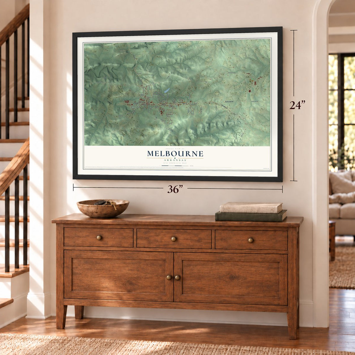 Melbourne, Arkansas map, 24 x 36 inch print in a black frame above a dresser by a staircase