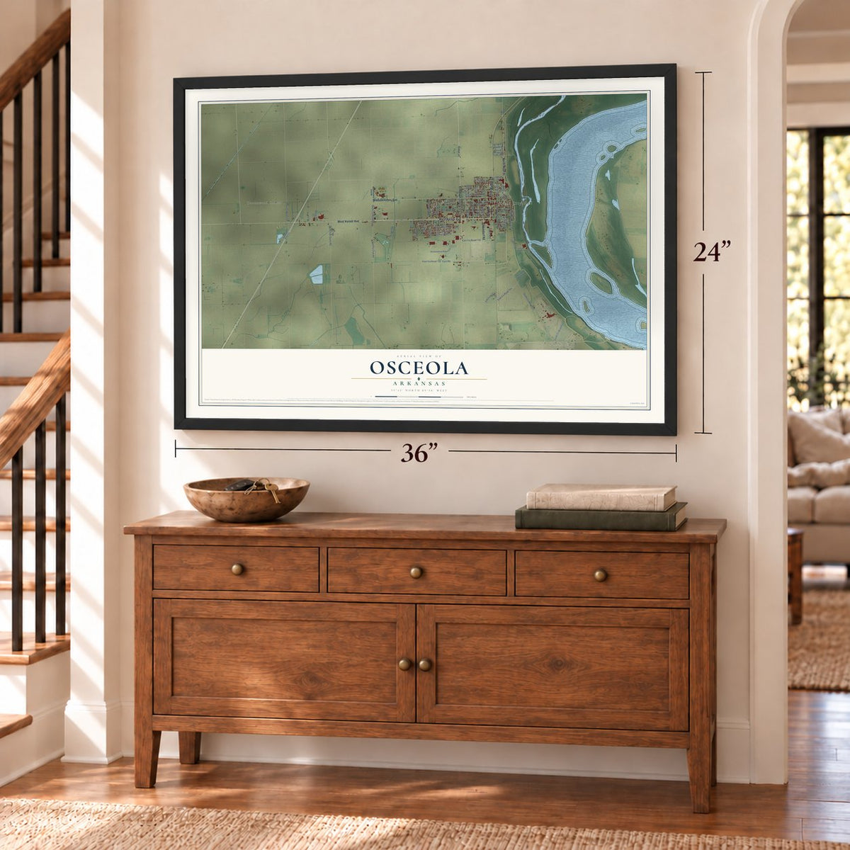 Osceola, Arkansas map, 24 x 36 inch print in a black frame above a dresser by a staircase