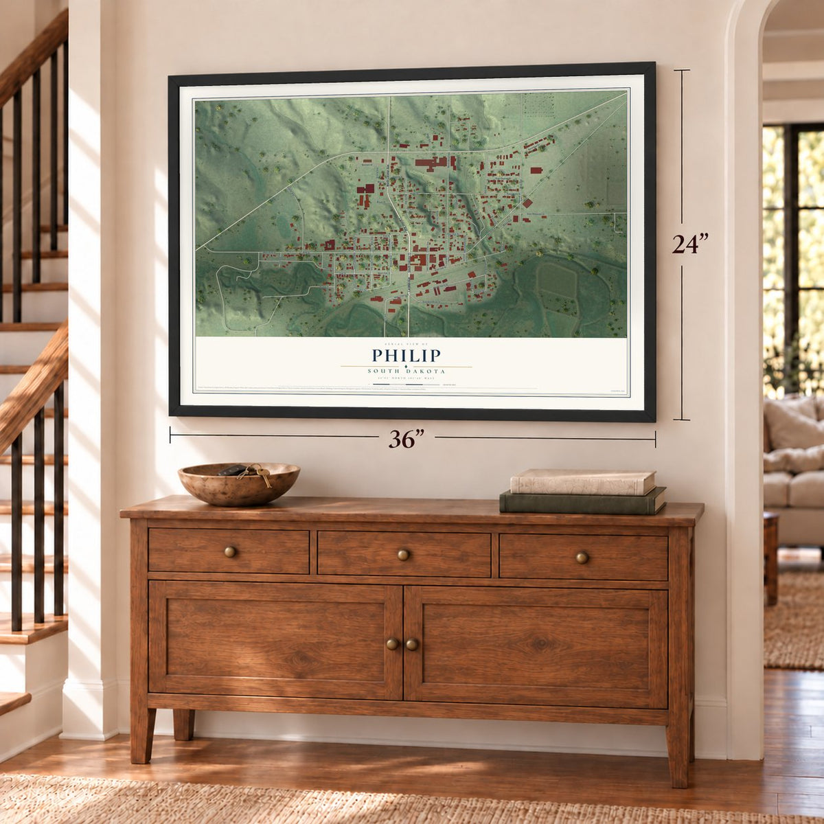 Philip, South Dakota map, 24 x 36 inch print in a black frame above a dresser by a staircase