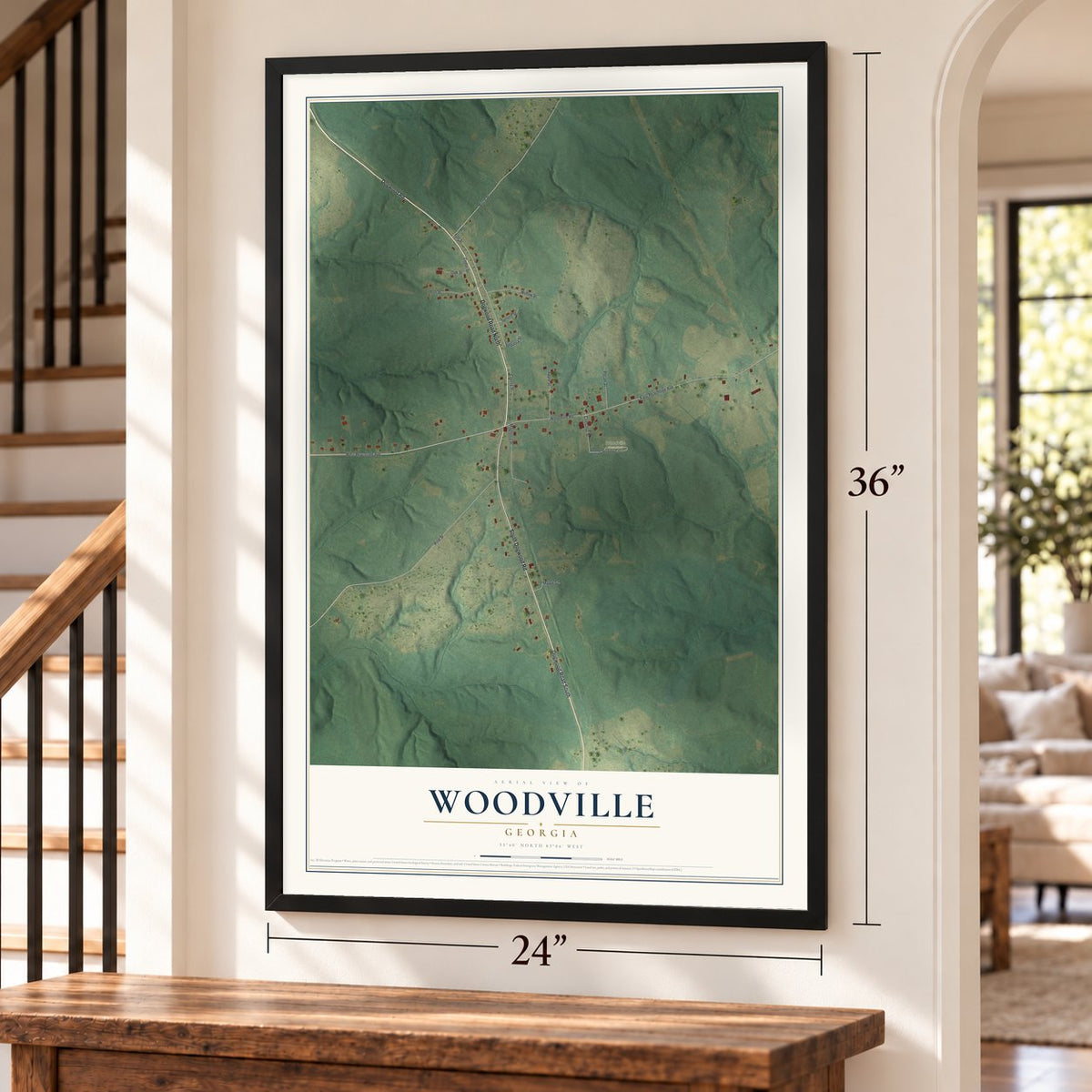 Woodville, Georgia map, 24 x 36 inch print in a black frame by a staircase