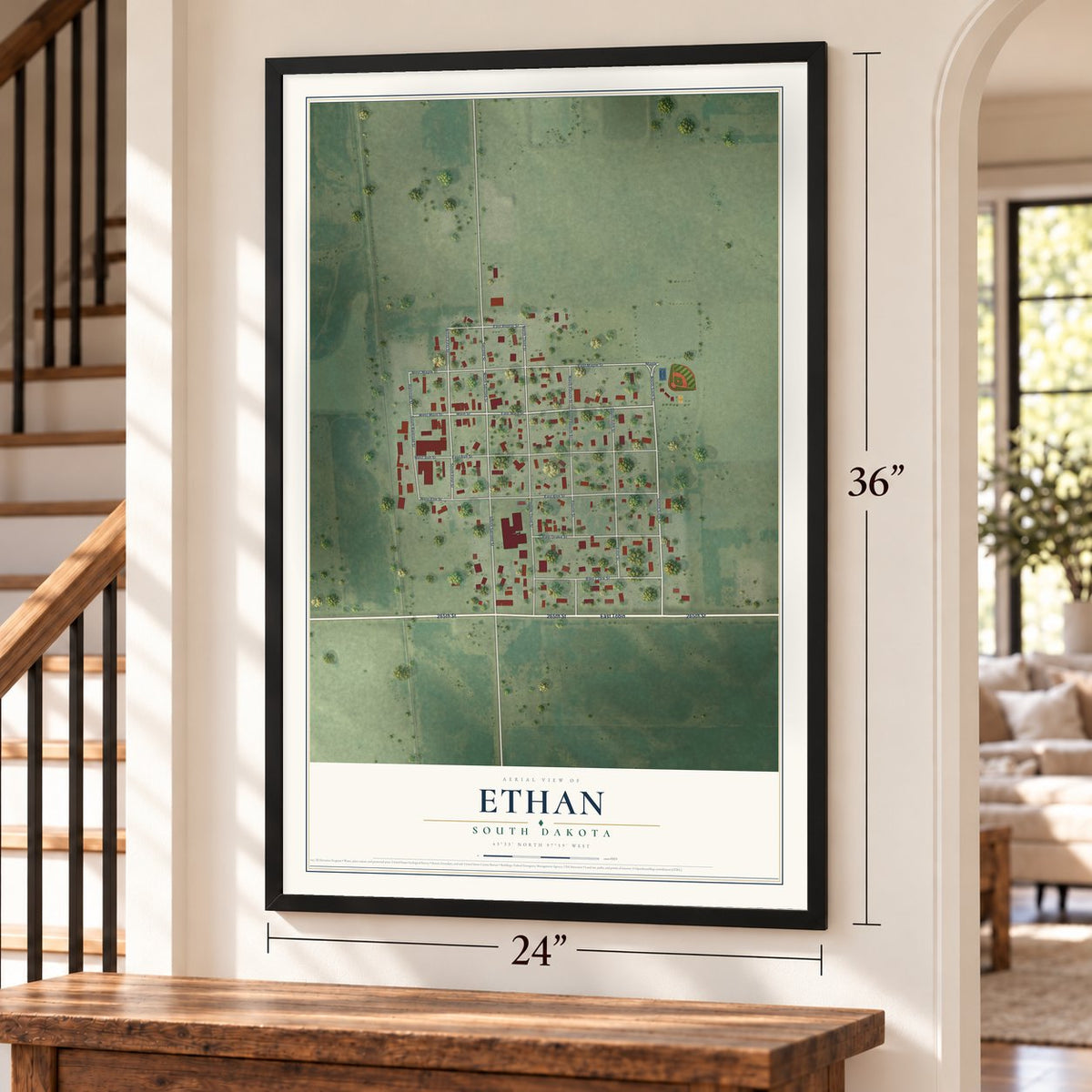 Ethan, South Dakota map, 24 x 36 inch print in a black frame by a staircase