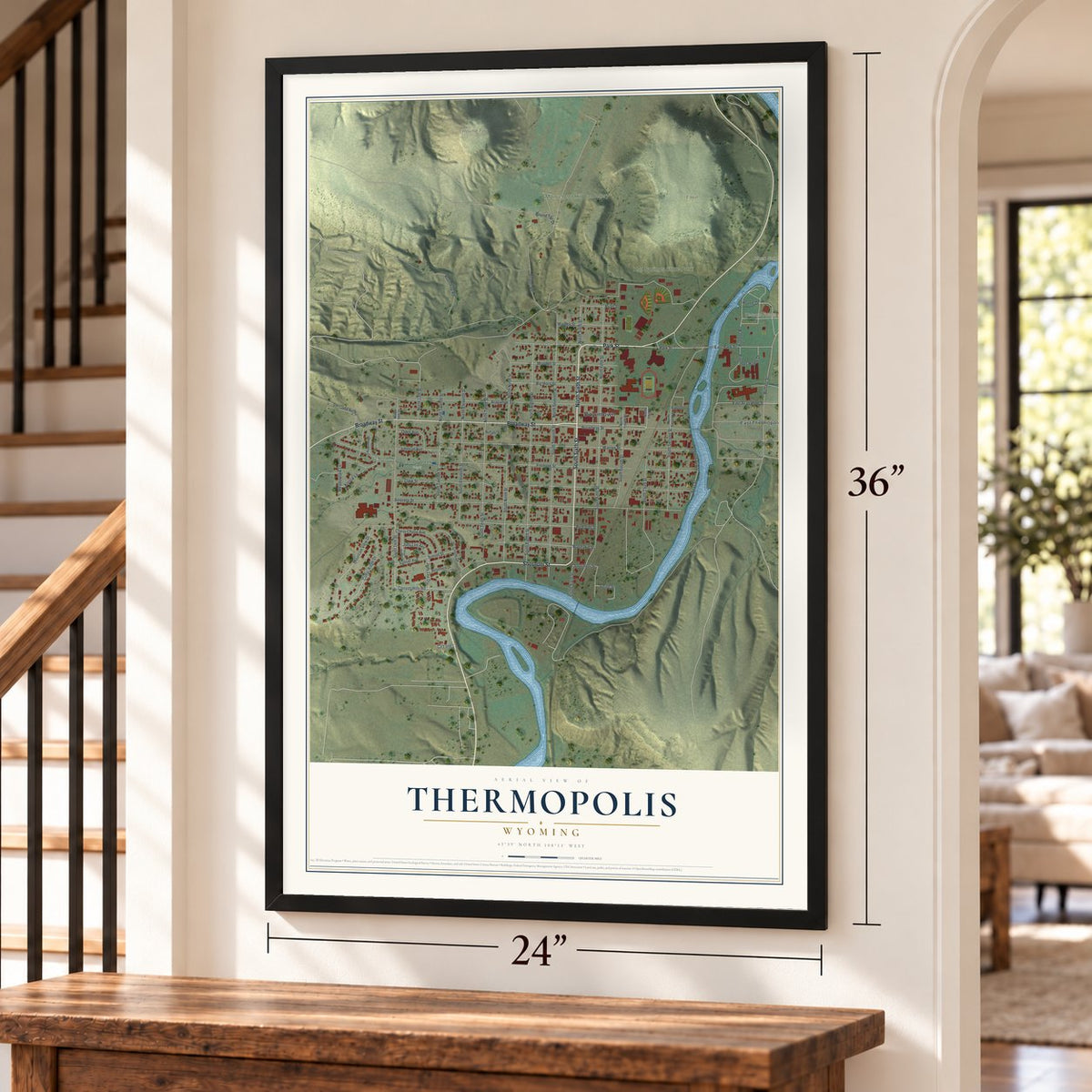 Thermopolis, Wyoming map, 24 x 36 inch print in a black frame by a staircase