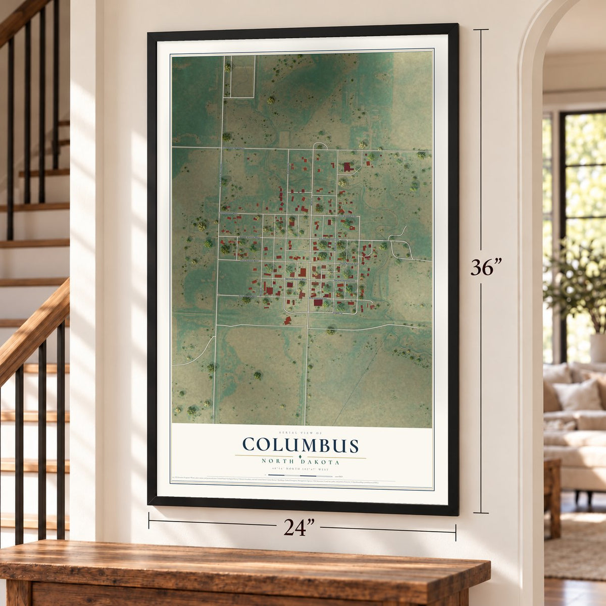 Columbus, North Dakota map, 24 x 36 inch print in a black frame by a staircase
