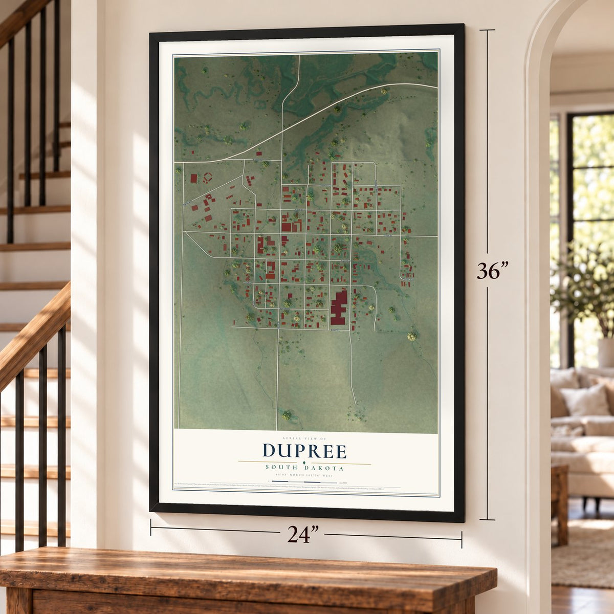 Dupree, South Dakota map, 24 x 36 inch print in a black frame by a staircase
